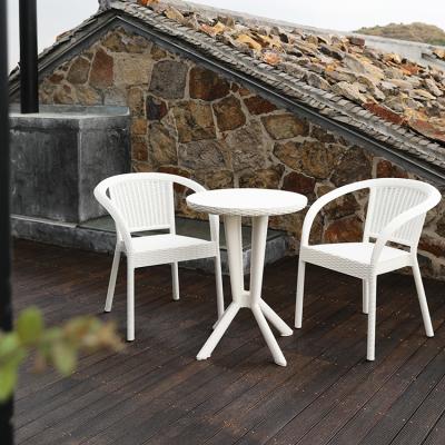 China UV protection rattan patio garden chair and modern plastic cafe table and chairs for sale