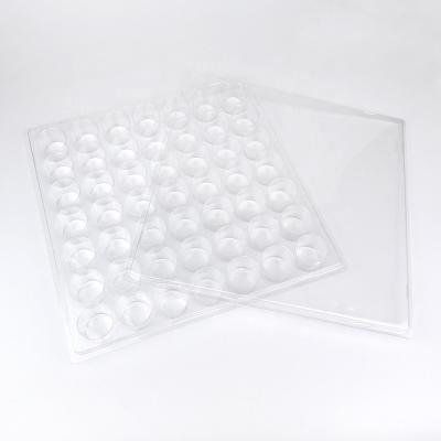 China 49 Holes Custom Clear Materials Food Grade PET Recycled Chocolate Food Clear Blister Plastic Tray Packaging for sale