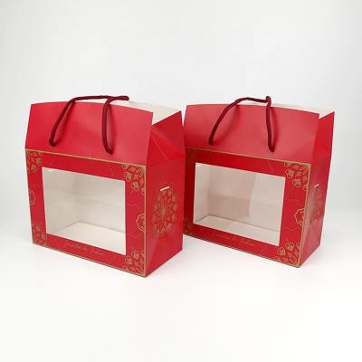 China Recycled Gift Materials Red Paper Packaging Box Custom Size Printed Logo With Handles Window for sale