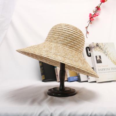 China Picture 2021 Summer Hand Made Wicker Foldable Sun Beach Hat Palm Leaf Straw Hat Palm Leaf Straw Hat For Women for sale