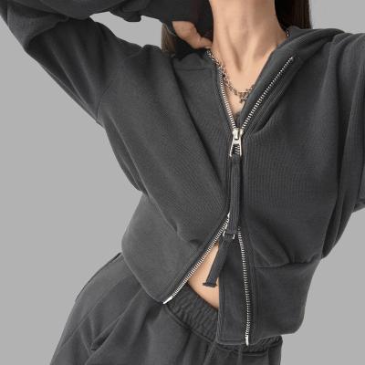 China Anti-wrinkle retro sports style loose waist and double zipper hooded sweater women's autumn short long sleeve coat XCC-020 for sale