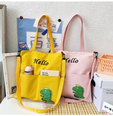 China Polyester large capacity fashion simple cute canvas student girl hand tote bag shoulder bag 2022 new for sale