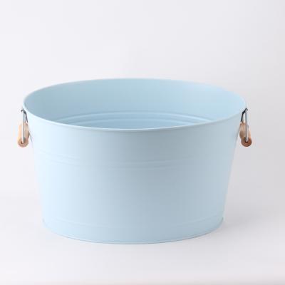 China Sustainable Metal Wine Ice Bucket Large Oval Storage Bucket Trash Can With Wooden Handles For Beverage Wine Fridge for sale