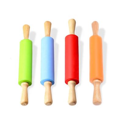 China Food Grade Silicone Durable Non-Stick Roller Pin With Wooden Handle Dough Rolling Tools 29cm for sale