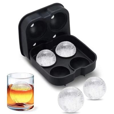 China Viable Reusable Round Ball Maker Reusable 4 Cavity Food Grade Silicone Bar Reusable Whiskey Ice Cube Mold for sale