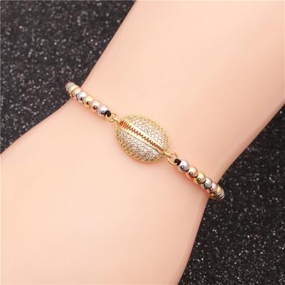 China Fashion Jewelry Durable Brass Zirconia Woven Gold Eye Beaded Bracelet For Women for sale