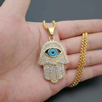 China Durable Hips Hops Hitter Jewelry Stainless Steel Bling Iced Out Blue Eyes Hand Necklace for sale