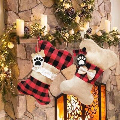 China Chirstmas Decor New Arrival 2022 Personalized Peg Dog Christmas Stockings Burlap Hanging Plaid Bone Shape Christmas Dog Bone Stocking for sale