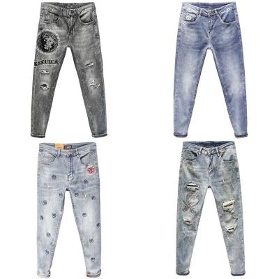 China Men's QUICK DRY Jeans Streetwear Fashion Blue Color Paint Printed Slim Fit Punk Designer Jeans Mens Designer Hip Hop Pants Style Jeans for sale