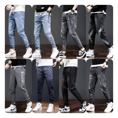 China QUICK DRY Custom Cotton Denim Pile Streetwear Loose Stacked Jeans Men Pants for sale