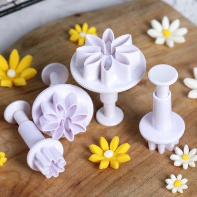 China 4pcs 3d Viable Custom Made White Plastic Daisy Flower Daisy Flower Fondant Cookie Molds Viable ABS PP Plunger Molds New for sale