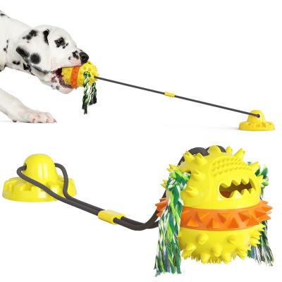 China Viable Pet Toys Dog Teeth Cleaning Rope Rubber Molar Ball Chew Suction Cup Interactive Bite Toys for sale