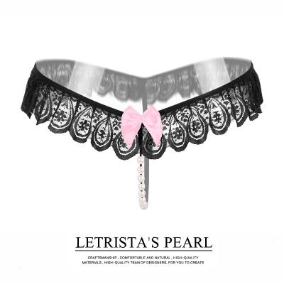 China Antibacterial Open Sexy Female Sense Thong Massage Pearl Underwear Transparent Thong T Pants for sale