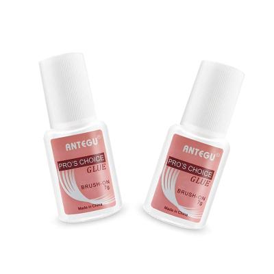 China Easy Apply High Quality 7g Nail Glue Bottle With Strong Brush Adhesive for sale