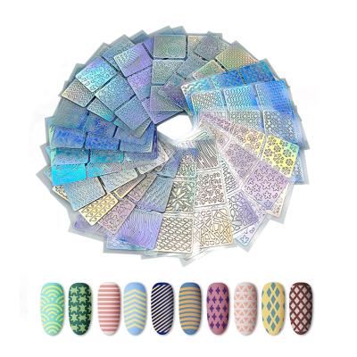 China Easy Apply Best Selling 24 Patterns Design Laser Nail Vinyls Stamp Hollow Nail Art Decals 3D Stickers for sale