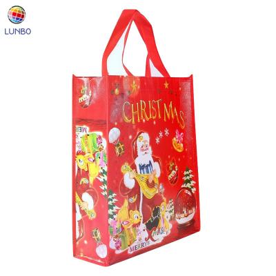 China Custom Handled Christmas 2021 Logo Printed Non Woven Christmas Gift Bag for sale