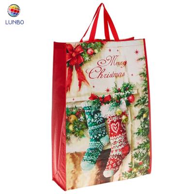 China Merry Christmas New Design Handled Non Woven Christmas Gift Bag PP Santa Sack for sale