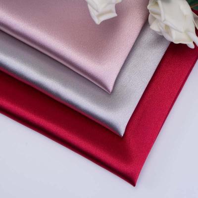 China Wholesale Viable Glitter Crystal Shiny Glossy Satin Silk Thick Fabric For Wedding Dress Fabric for sale