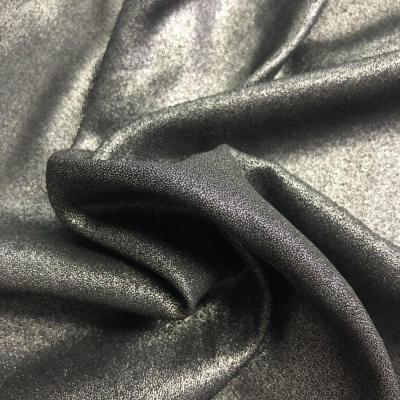 China Waterproof shell fabric100% recycled polyester fabric with silver foil print soft handfeeling for sale