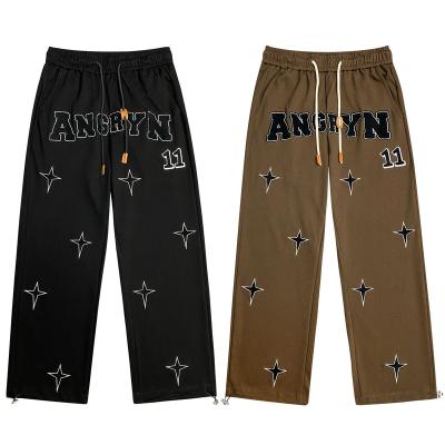 China Custom Logo Trousers Wholesale Casual Streetwear Anti-Wrinkle Straight Wide Leg Joggers Star Embroidery Loose Sweatpants for sale