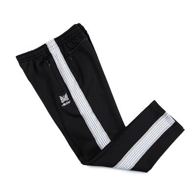 China Wholesale Custom Anti-wrinkle Mens Track Nylon Black And White Striped Pants With Stripe for sale