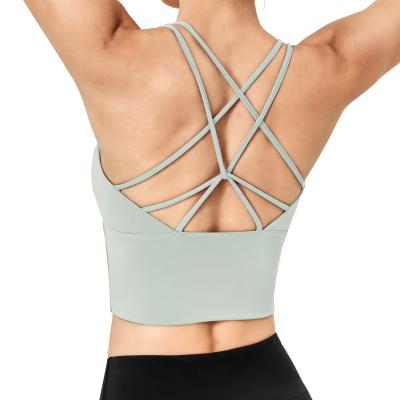 China Breathable Seamless Woman Hot Sexy Yoga Sports Support Cross Strappy Bra Top 2022 for sale