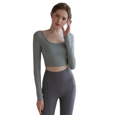 China 2022 breathable spring and summer style beautiful back sports tops with chest pad women's fitness long sleeve yoga clothes for sale