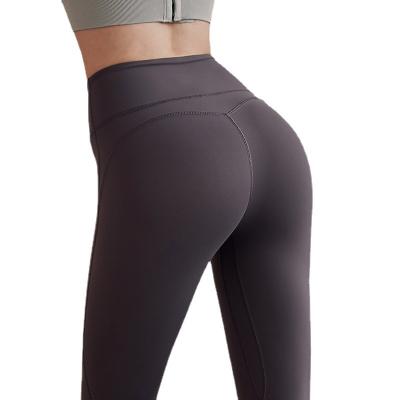 China 2022 Breathable High End Professional Yoga Pants Women's High Waist Hip Lifting Net Red Sports Running Peach Hip Fitness Exercising Pants for sale