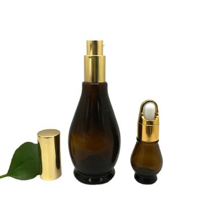 China Unique Fancy Shape 10ml, 20ml, 30ml, 50ml, 100ml Browm Essential Oil Personal Care Dark Gourd Glass Bottle With Dropper for sale