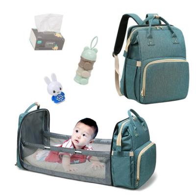 China With New Large Capacity USB Multi Function Diaper Backpack Lightweight Mummy Baby Diaper Backpack With Bed Function for sale