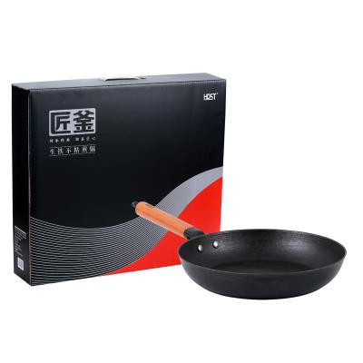 China Amazon Stocked Hot Selling Chinese Cast Iron Wok Casserole With Handle Cast Iron Stir Wood Frying Pan for sale