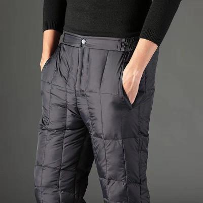 China Waterproof bottom pants men's outer wear high waist thickened warm white duck down pants plus size cotton in winter for sale