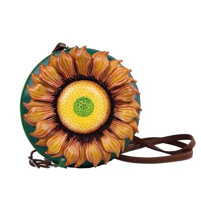 China Portable handmade vegetable tanned retro sunflower shoulder bag fashion plant flower messenger soft leather carving bag for sale