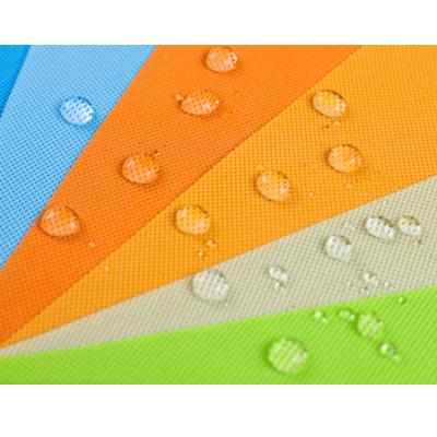 China Eco pp spunbond waterproof colorful waterproof laminated non woven fabric for bag making for sale