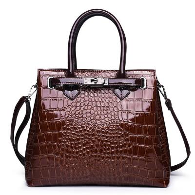 China 2020 European and American women's alligator pattern cross-shoulder bag waterproof hand-held women's bag patent leather shiny women's bag for sale