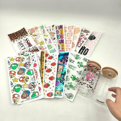 China Cartoon 16oz glasses uv dtf film sticker cold transfer tumbler wrap uv DTF sticker transfer. for sale