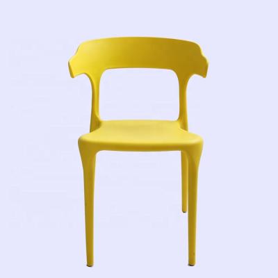 China Modern Plastic Wenger & Hans Elbow Cow Horn Plastic Chair With Yellow for sale