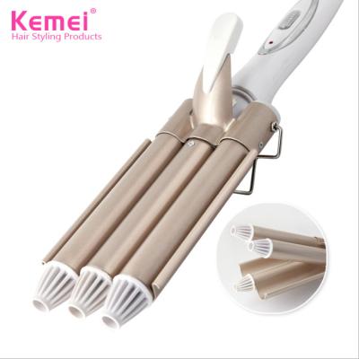 China Kemei KM-1010 three safety large tube hair curler stick water splint egg roll egg roll head curling curling splint for sale