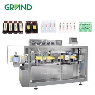 China El relleno plástico y el lacre de la ampolla del aceite de oliva trabajan a máquina/máquina de rellenar líquida automática en venta