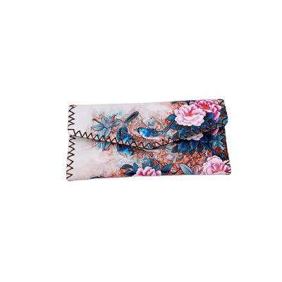 China Hot Selling PU Anti-theft Multi Functional Ethnic Wallet Card Storage Change Style Lady's Quilter Quilter Wallet for sale