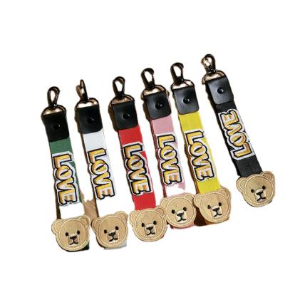 China Wholesale creative private custom made polyester brown bear embroidery key chain embroidery key chain for sale