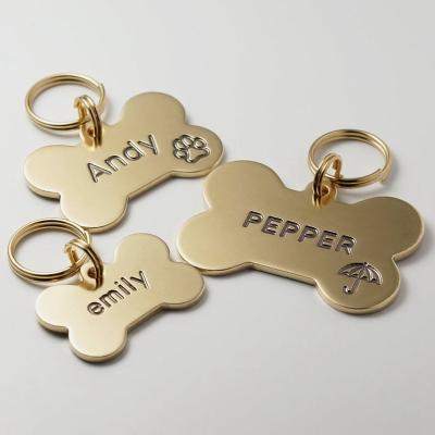 China 2021 Newly Customized Dog Tag Bone Shape Pet ID Tag North American Pendant Dog Tag for sale