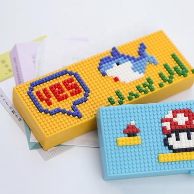 China Schools & Popular ABS Plastic DIY Pencil Case Gifts Building Blocks Cartoon Pencil Case Of Desks For Students for sale