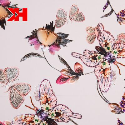 China Modern Design Style Butterfly Pattern Shrink-Resistant Casual Light Pink Fabric For Beach Dress for sale