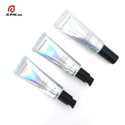 China Cosmetic Shiny Silver Cosmetic Plastic Tubes With Black Pump Applicator 20ml 30ml Laminated Customized Plastic Tube Print Airless Tube for sale