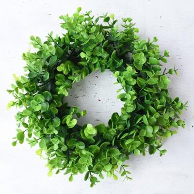 China Wedding Factory wholesale wedding Christmas door decoration trumpet plastic evengreen grass leaves eucalyptus garland artificial wreaths for sale