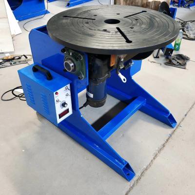 China Automatic Mechanical Pipe Sewing Positioner Ring Pipe Production 100kg Turntable Stand Reducer Rotary Table For Welding for sale