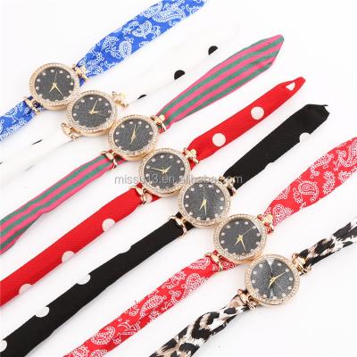 China 2019 New Style Women's Day/Date Long Watch Women's Strap Fabric Quartz Watch for sale