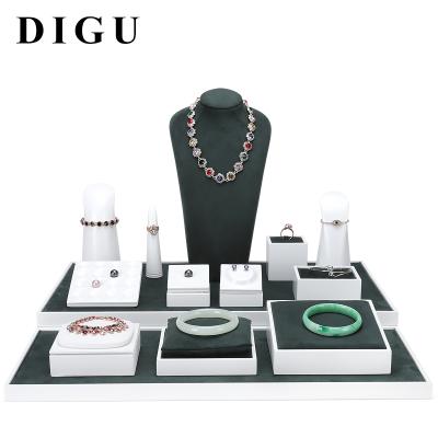 China DIGU Modern Modern Jewelry Counter Display Props Leather Lacquer Jewelry Display Set Ring Pendant Bracelet Necklace Display Tray for sale