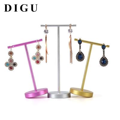 China Creative metal stud earrings ornaments props display jewelry display shelf environmental protection earrings rack for sale